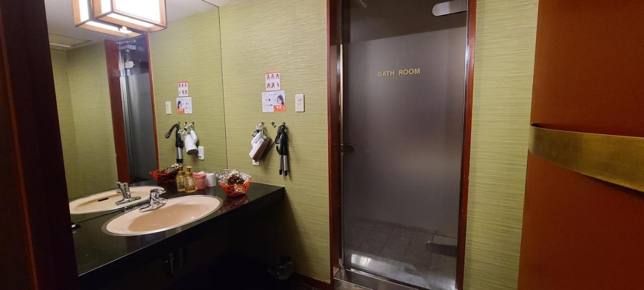 Tweepersoonskamer met 2 Aparte Bedden